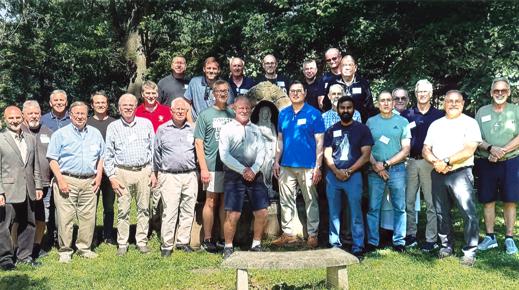 Men from Cincinnati Cursillo 233 gathered outdoors after their weekend